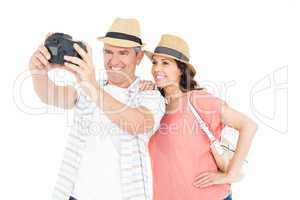 Happy couple taking photo