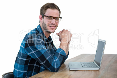 Handsome man working on laptop