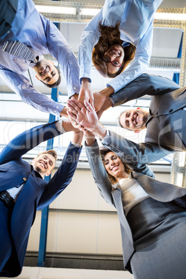 Businesspeople hands stacked over each other