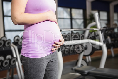 Pregnant woman in sportswear