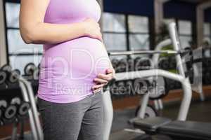 Pregnant woman in sportswear