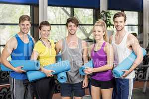 Group of people with fitness mat