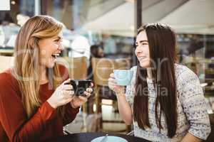 Friends chatting over coffee