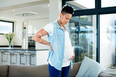 Pregnant woman touching her belly