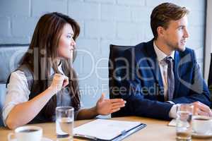 Businesspeople having a discussion in conference room