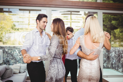 Group of young friends dancing