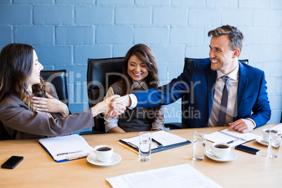 Businesspeople having a discussion in conference room