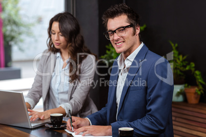 Business people working with laptop and coffee