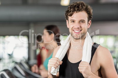 Smiling athletic man smiling to camera