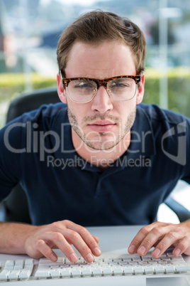 Handsome man using computer
