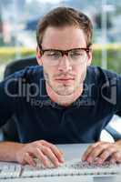 Handsome man using computer