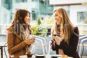 Friends chatting over coffee