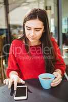 Woman using her smartphone