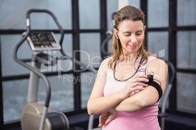 Pregnant woman listening to music