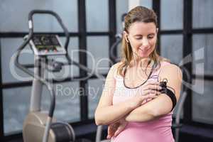 Pregnant woman listening to music