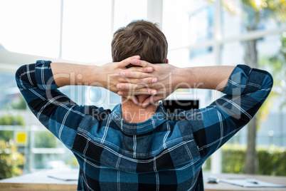 Handsome man outstretching his arms