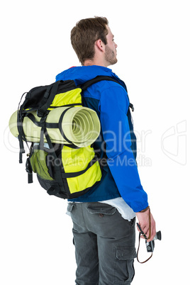 Side view of backpacker hipster