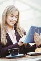 Businesswoman using her tablet pc