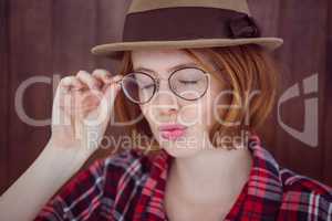 hipster woman posing with her eyes closed