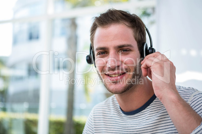 Handsome man working with headset