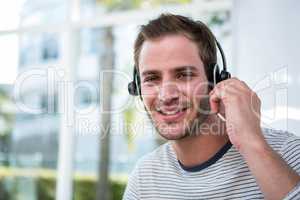 Handsome man working with headset