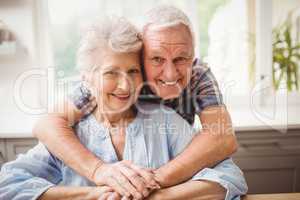 Portrait of senior couple embracing