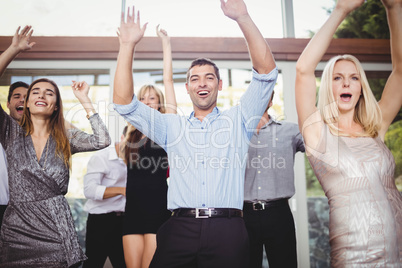 Group of young friends dancing