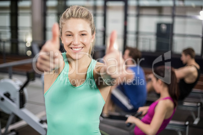 Sportswoman showing thumbs up