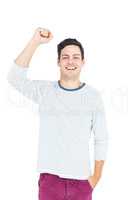 Triumphant man raising fist