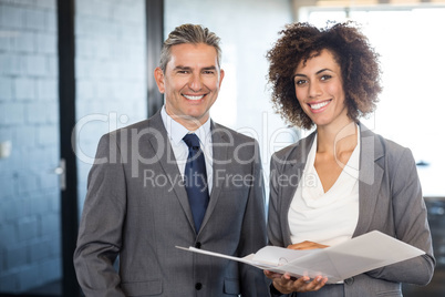 Businessman and colleague with documents