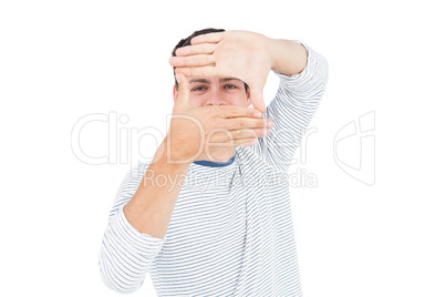 Man looking at camera and gesturing