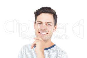 Smiling man with hand on chin
