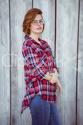 beautiful hipster woman with her arms crossed