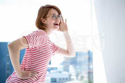 Cute red haired hipster with glasses