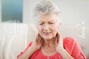 Senior woman suffering from neck pain