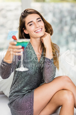 Portrait of beautiful woman having mocktail