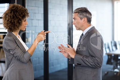 Businesspeople having a discussion in office