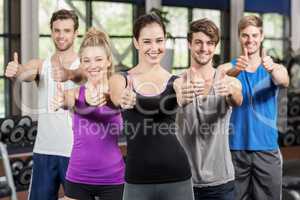 Fitness class showing thumbs up