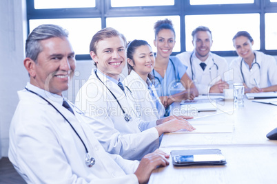 Medical team smiling at conference room