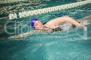 Sporty woman swimming