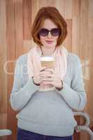 Red haired hipster drinking coffee