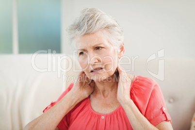 Senior woman suffering from neck pain