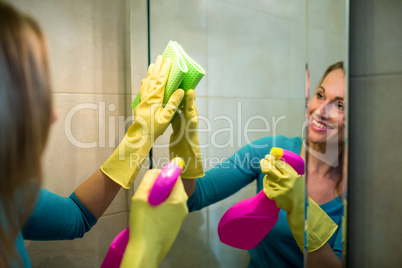 Pretty woman doing her house chores