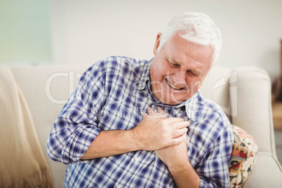 Senior man getting chest pain