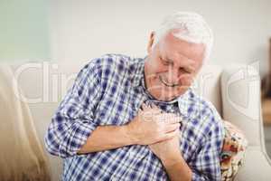Senior man getting chest pain