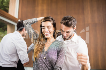 Group of young friends dancing