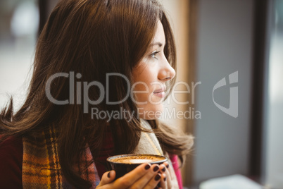 Woman drinking a cup of coffee