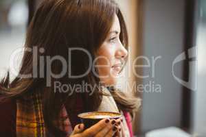 Woman drinking a cup of coffee