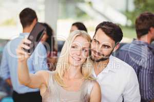 Young friends taking selfie