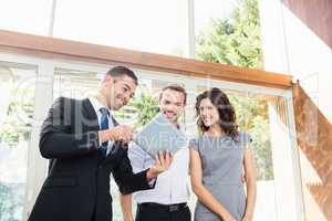 Real-estate agent showing couple new home
